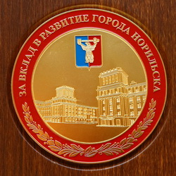 Знак отличия "За вклад в развитие города Норильска"