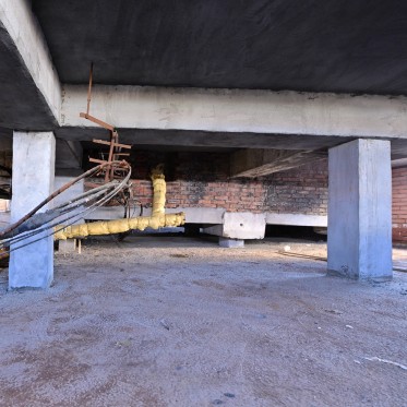 Ремонт нулевого цикла подполья на ул. Ленинградской, 3 на стадии завершения